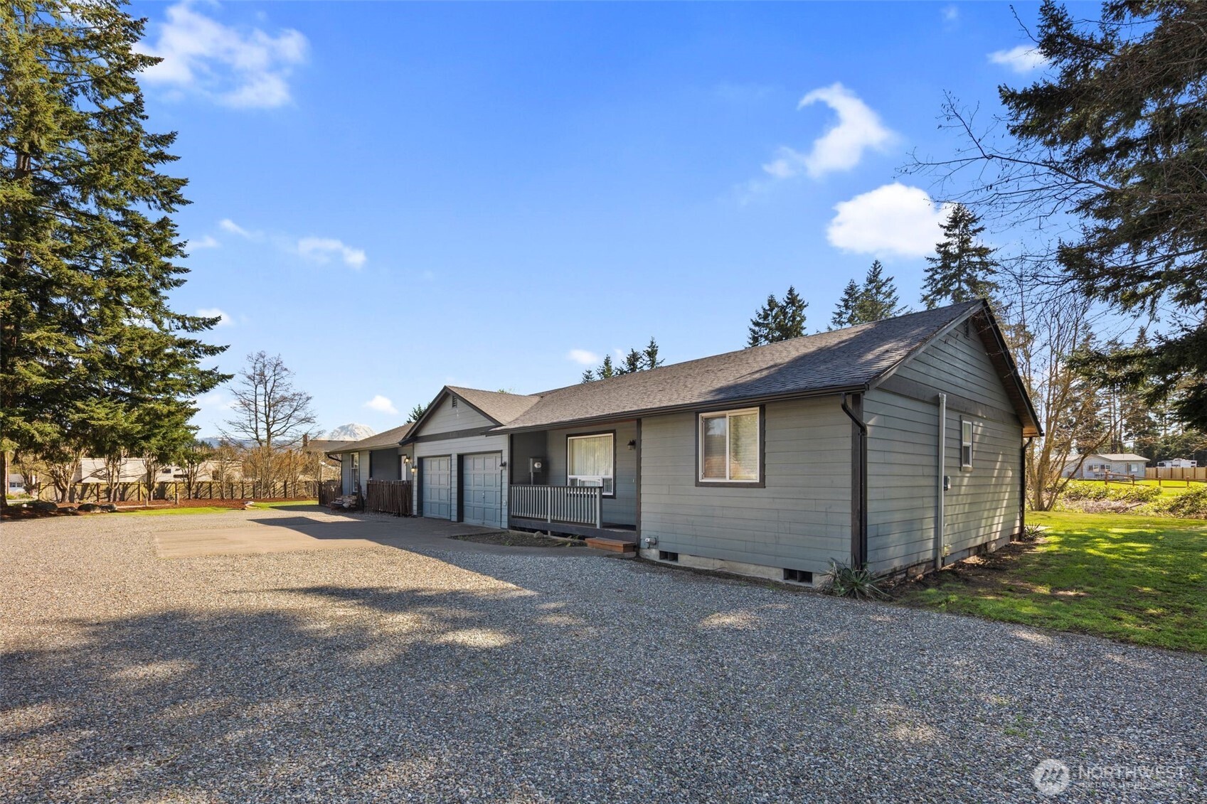 22424 South Prairie Road East Bonney Lake, WA 98391 - Photo 29 of 32 a view of a house with a yard