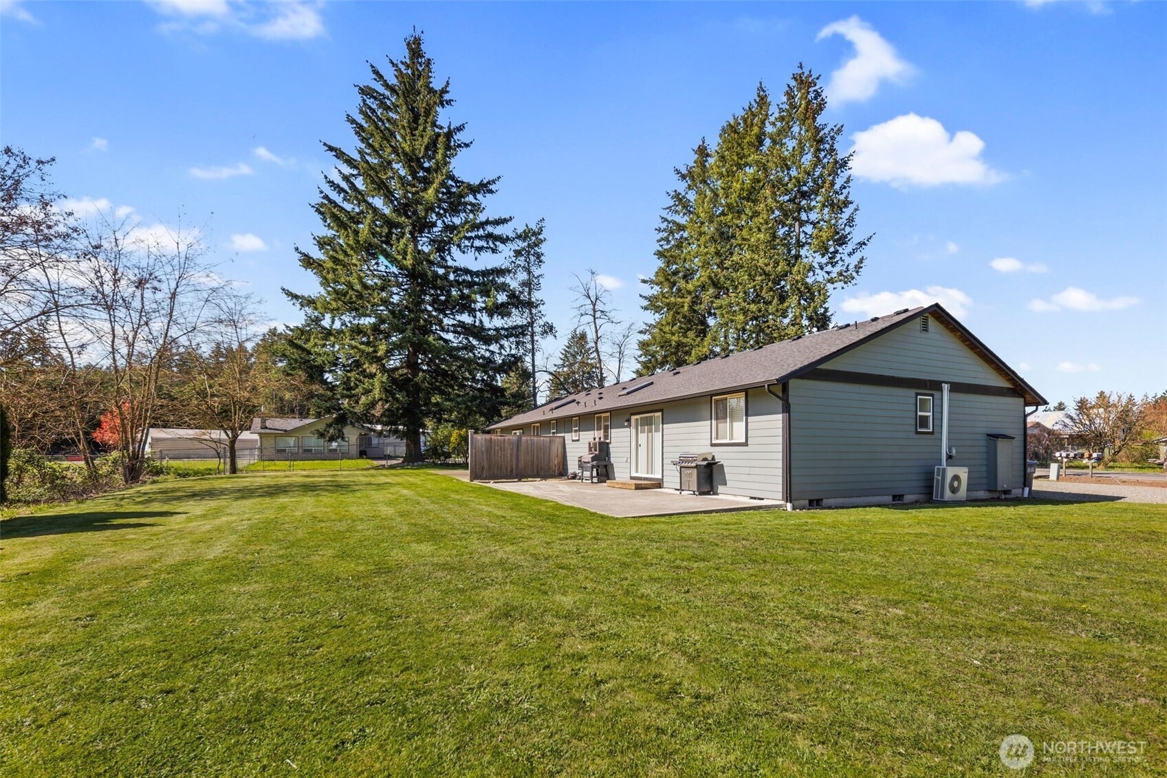 22424 South Prairie Road East Bonney Lake, WA 98391 - Photo 30 of 32 a view of a house with a big yard