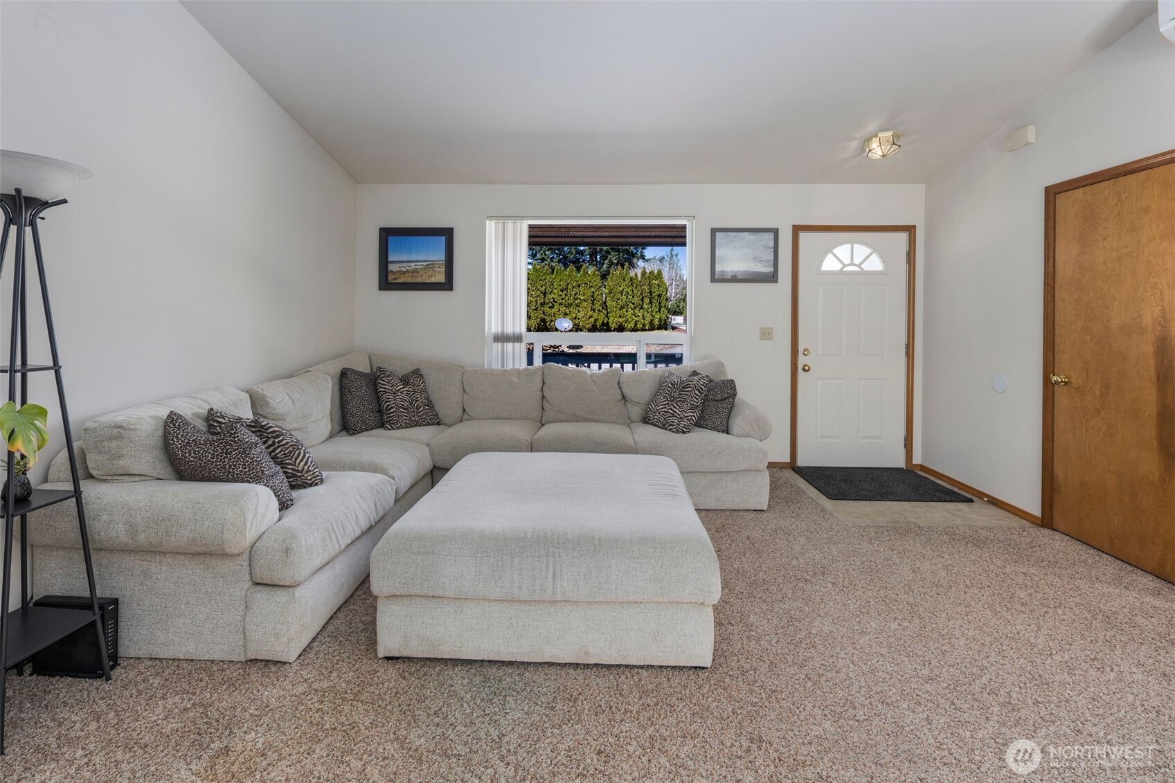 22424 South Prairie Road East Bonney Lake, WA 98391 - Photo 8 of 32 a living room with furniture and a window