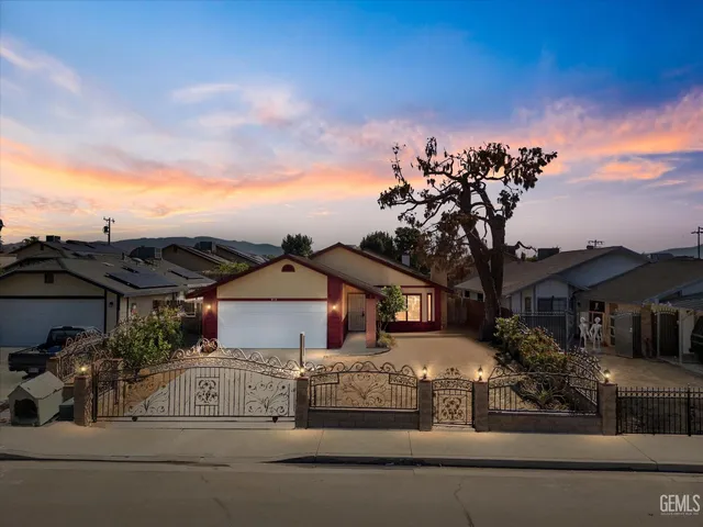 front view of a house with a street