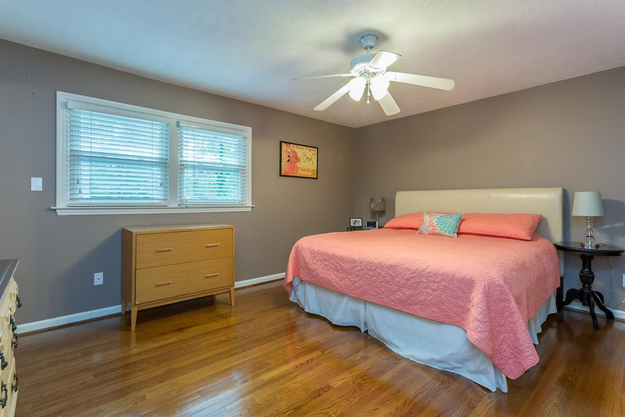 7608 Harps Mill Road Raleigh, NC 27615 - Photo 14 of 25 The master suite is located in the back of the house and features beautiful hardwood floors and great closet space! Master Suite