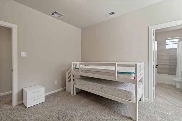 a view of room with air conditioner and window