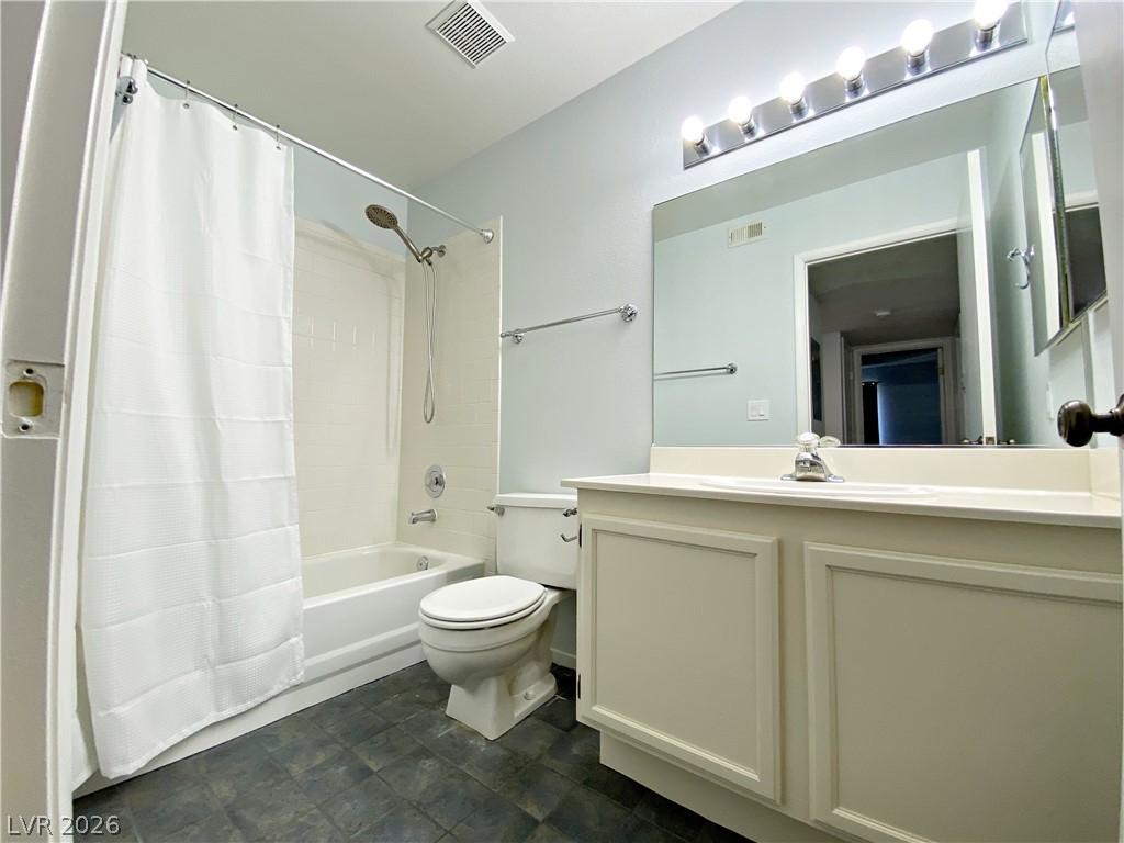 1575 West Warm Springs Road, Unit 1024 Henderson, NV 89014 - Photo 7 of 25 Functional full bathroom featuring an integrated shower-tub combination and a single vanity with ample counter space.