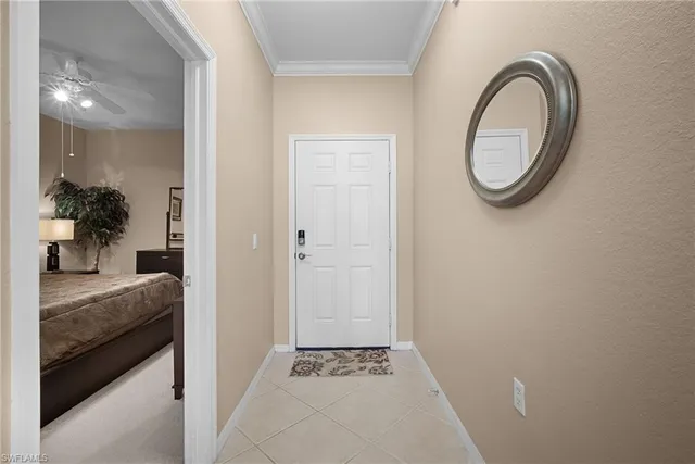 a bathroom with a granite countertop sink a mirror and a bathtub