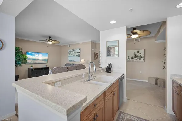 a view of living room with granite countertop furniture and fireplace