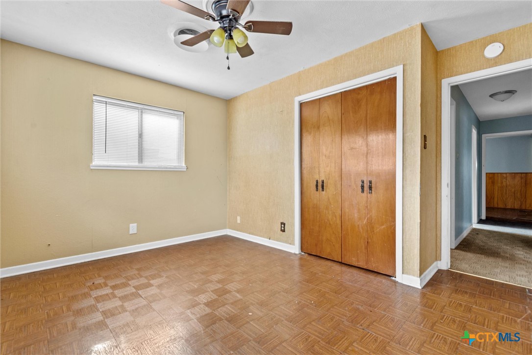 1101 Ridgeway Drive Killeen, TX 76549 - Photo 11 of 31 a view of an empty room with a fan