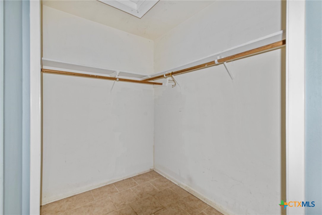 1101 Ridgeway Drive Killeen, TX 76549 - Photo 28 of 31 a view of a room with racks on the wall