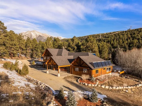 a view of a swimming pool with lounge chairs