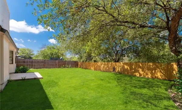 a view of a backyard with a garden