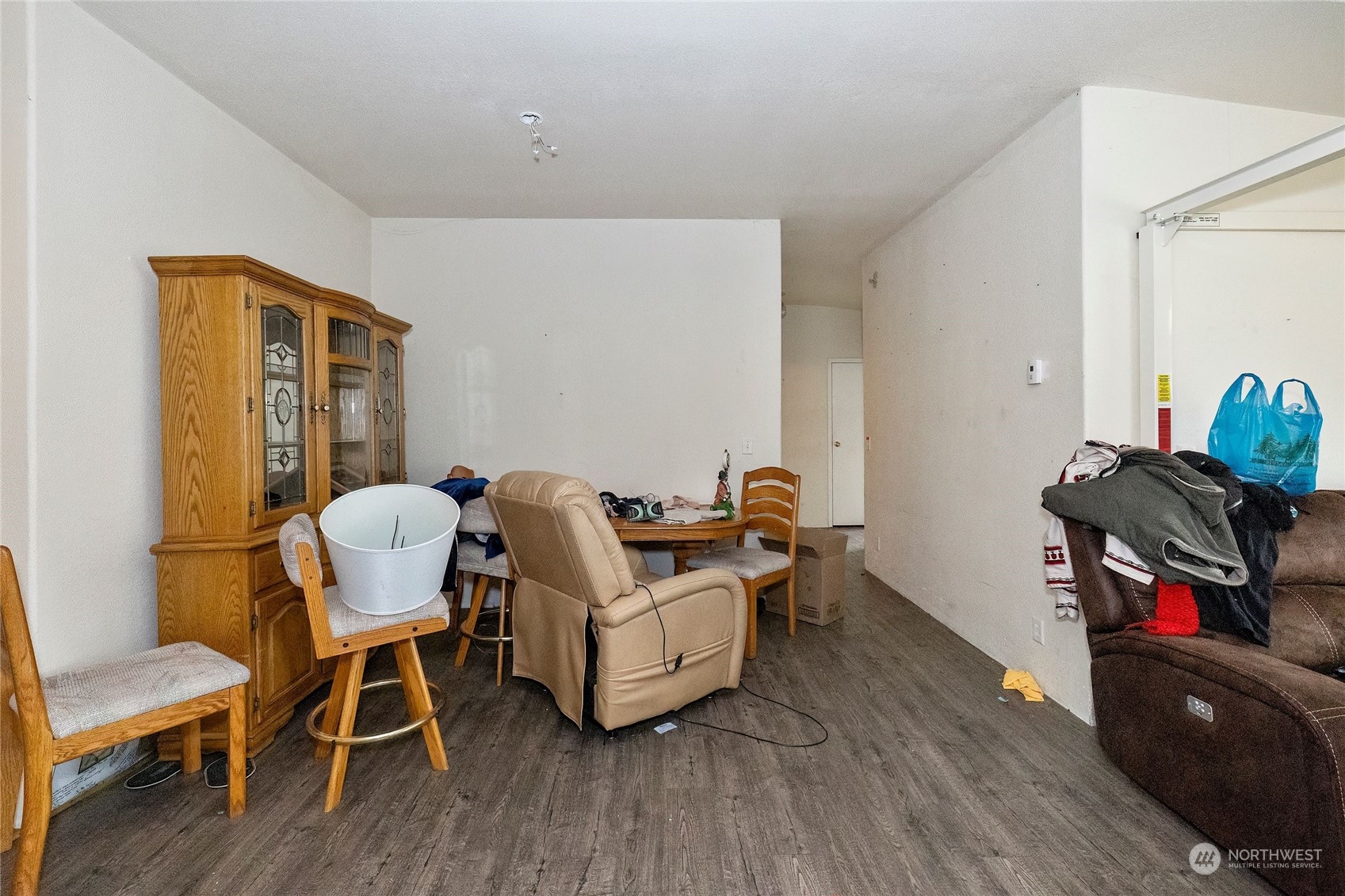 245 Griffith Farm Road Sequim, WA 98382 - Photo 19 of 33 a living room with furniture and wooden floor