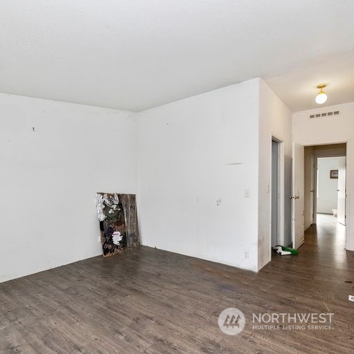 245 Griffith Farm Road Sequim, WA 98382 - Photo 25 of 33 a view of empty room with wooden floor