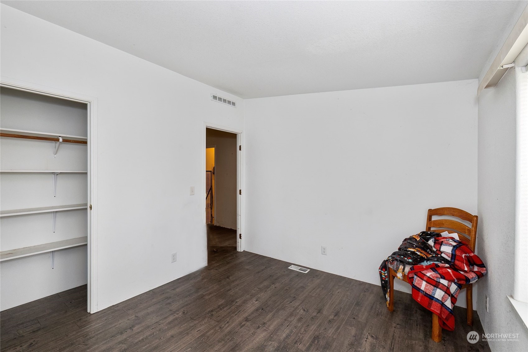 245 Griffith Farm Road Sequim, WA 98382 - Photo 28 of 33 a view of a room with wooden floor and closet
