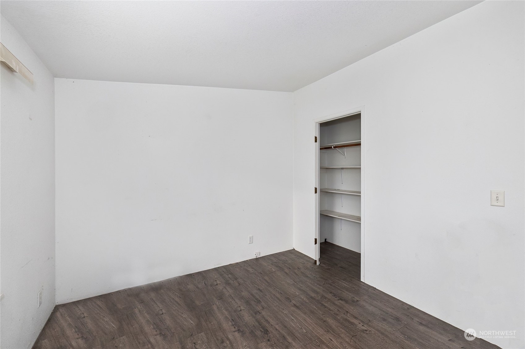 245 Griffith Farm Road Sequim, WA 98382 - Photo 29 of 33 a view of an empty room and wooden floor