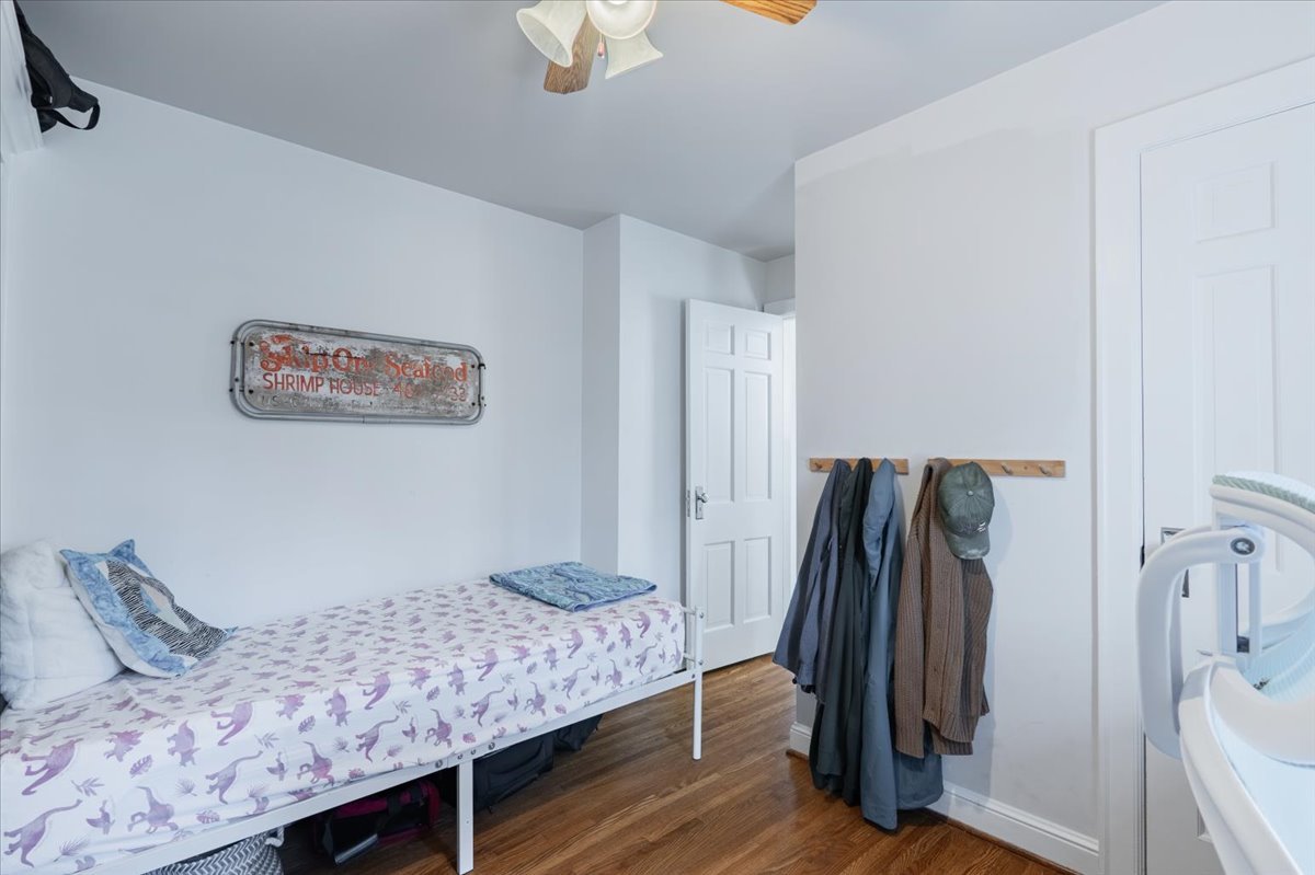 413 Grant Street Normal, IL 61761 - Photo 14 of 40 a living room with furniture and a wooden floor