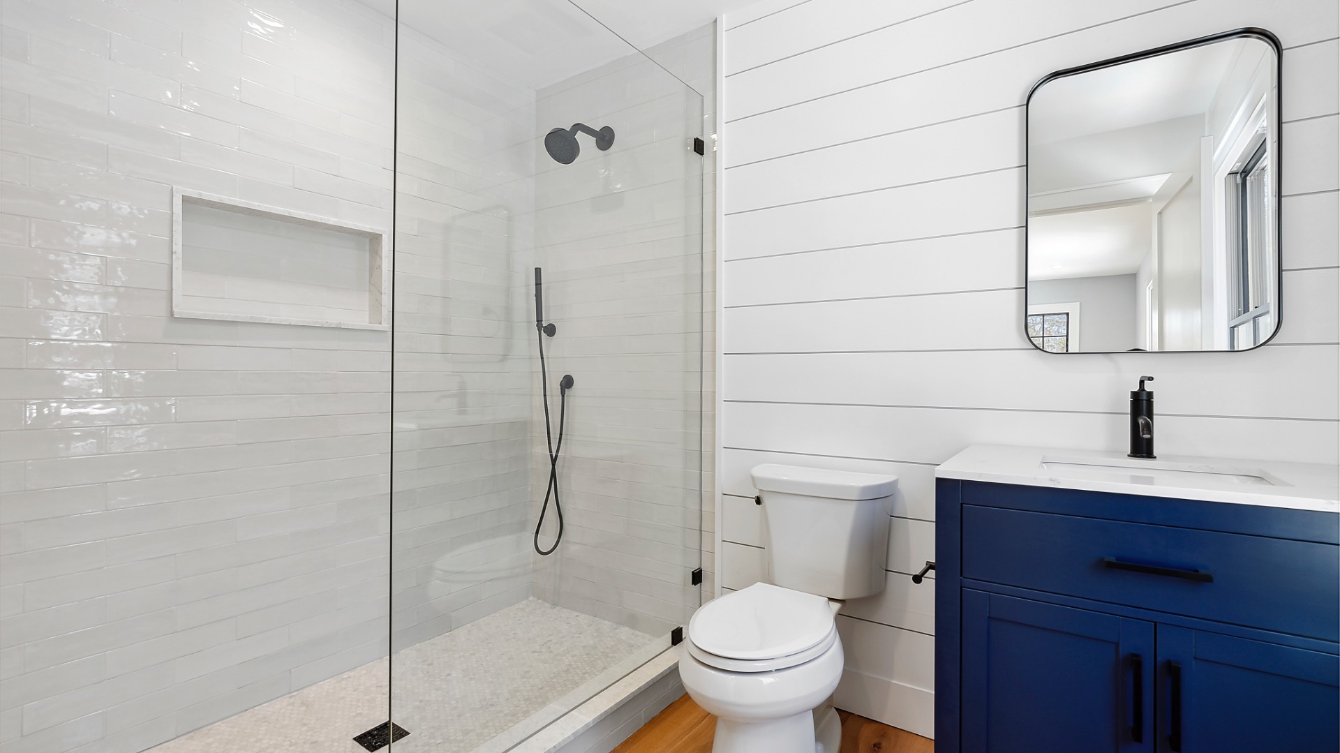 60 Kings Point Road East Hampton, NY 11937 - Photo 12 of 27 a bathroom with a sink a toilet and shower