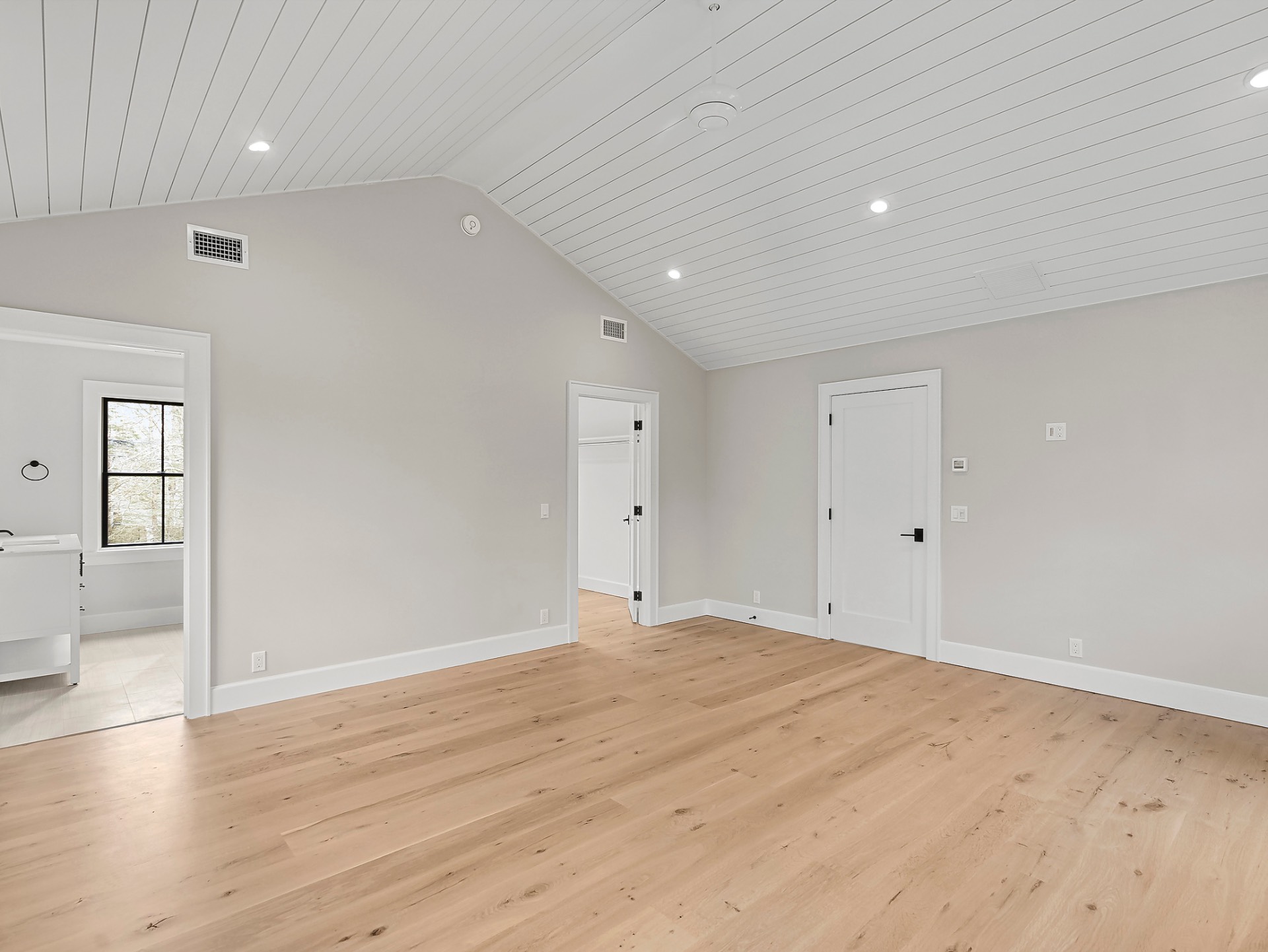 60 Kings Point Road East Hampton, NY 11937 - Photo 13 of 27 wooden floor in an empty room with a window