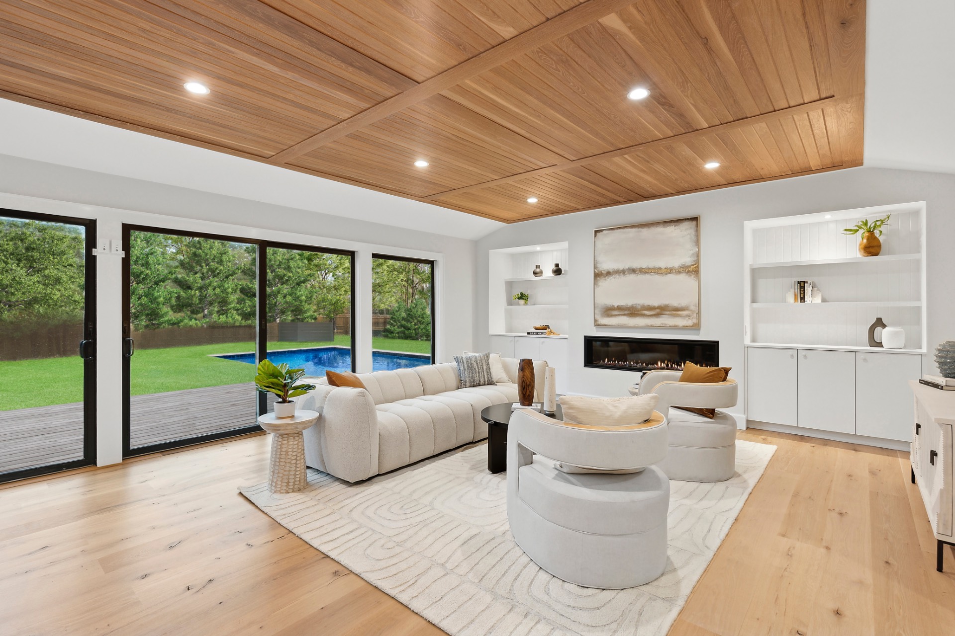 60 Kings Point Road East Hampton, NY 11937 - Photo 2 of 27 a living room with furniture and a flat screen tv