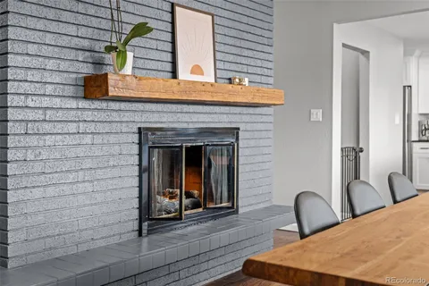 a view of a balcony with table and chairs