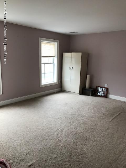 280 Aldrich Road Howell, NJ 07731 - Photo 12 of 13 a view of an empty room with a window