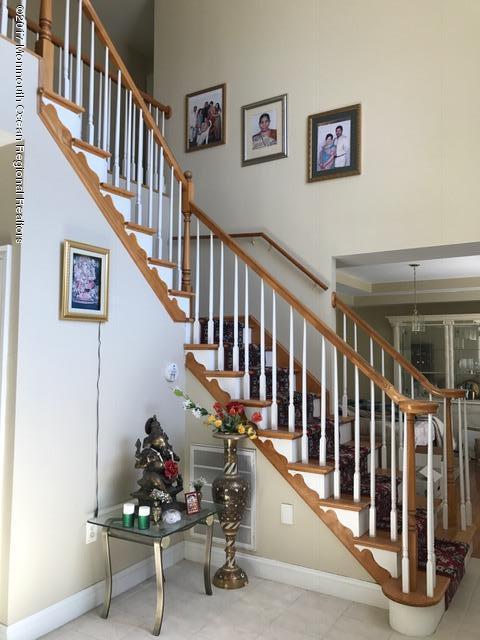 280 Aldrich Road Howell, NJ 07731 - Photo 4 of 13 a view of entryway with wooden floor