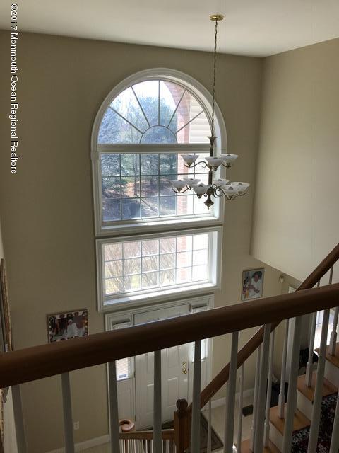 280 Aldrich Road Howell, NJ 07731 - Photo 7 of 13 a view of an empty room with a window