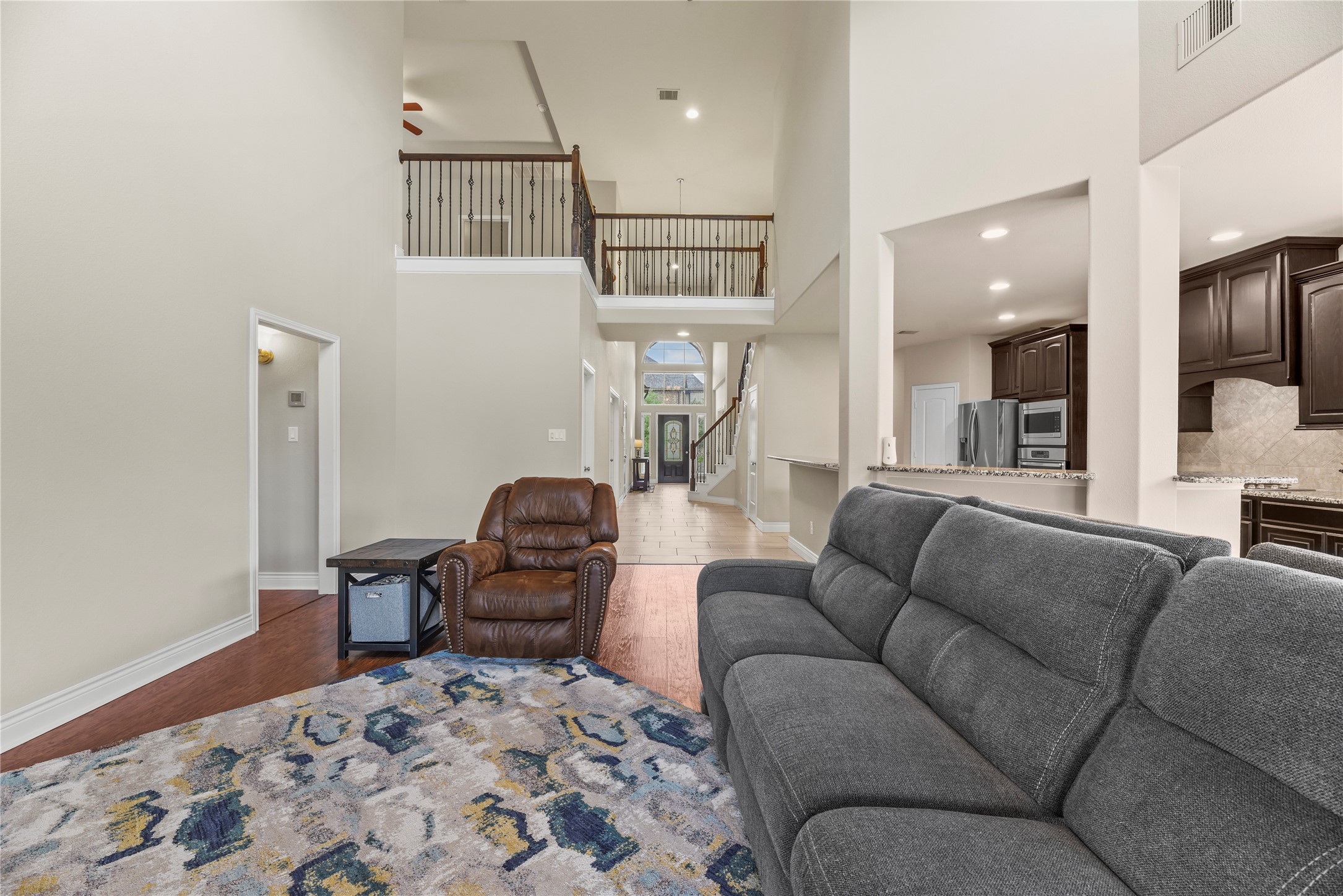 3834 Trophy Ridge Drive Spring, TX 77386 - Photo 19 of 43 a living room with furniture and a wooden floor