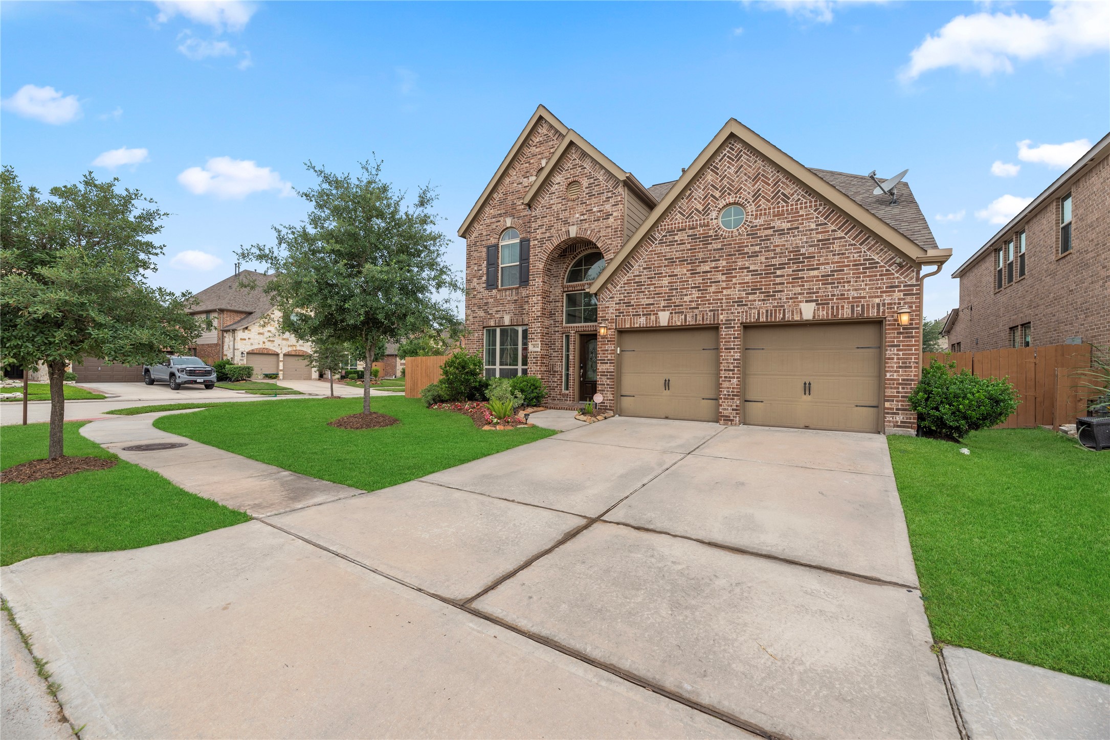 3834 Trophy Ridge Drive Spring, TX 77386 - Photo 2 of 43 a front view of a house with a yard