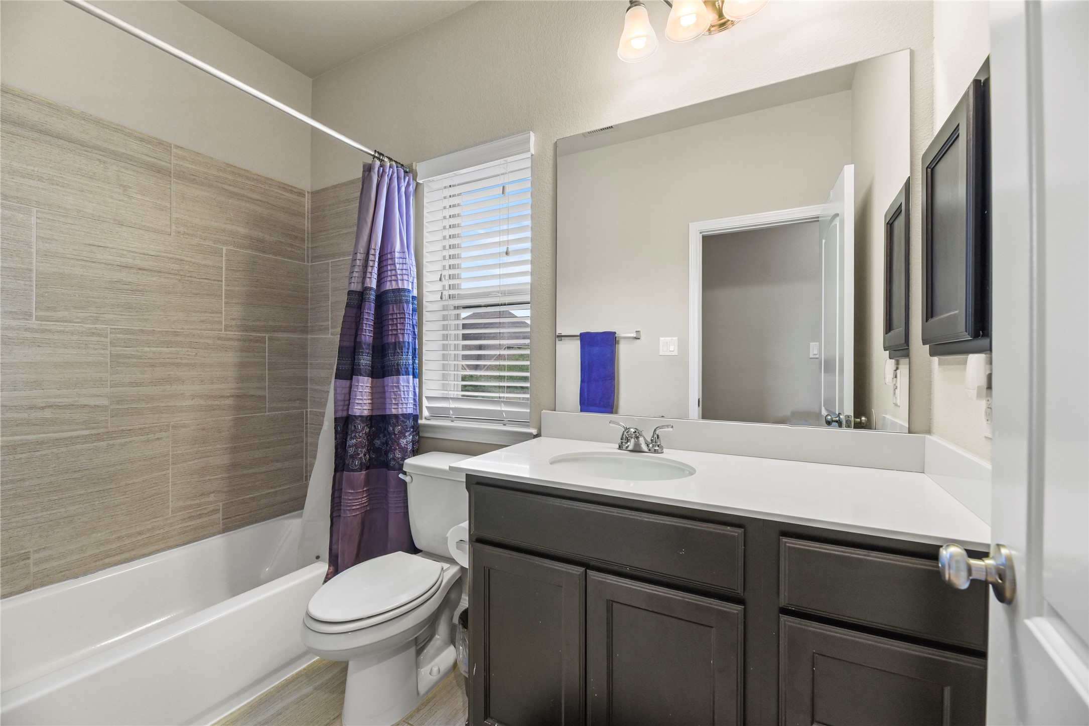3834 Trophy Ridge Drive Spring, TX 77386 - Photo 33 of 43 a bathroom with a sink toilet vanity and tub