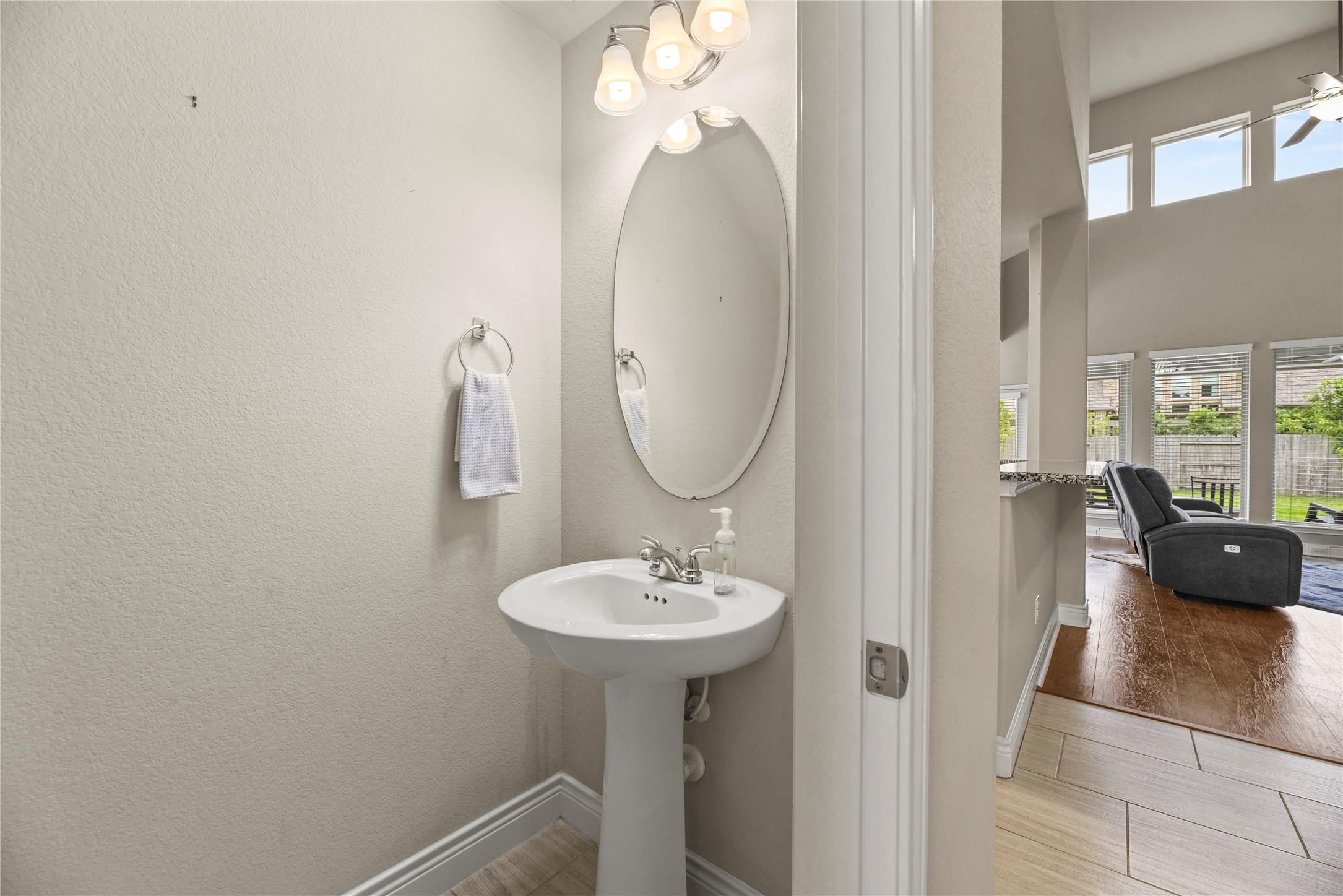 3834 Trophy Ridge Drive Spring, TX 77386 - Photo 9 of 43 a bathroom with a sink and a mirror