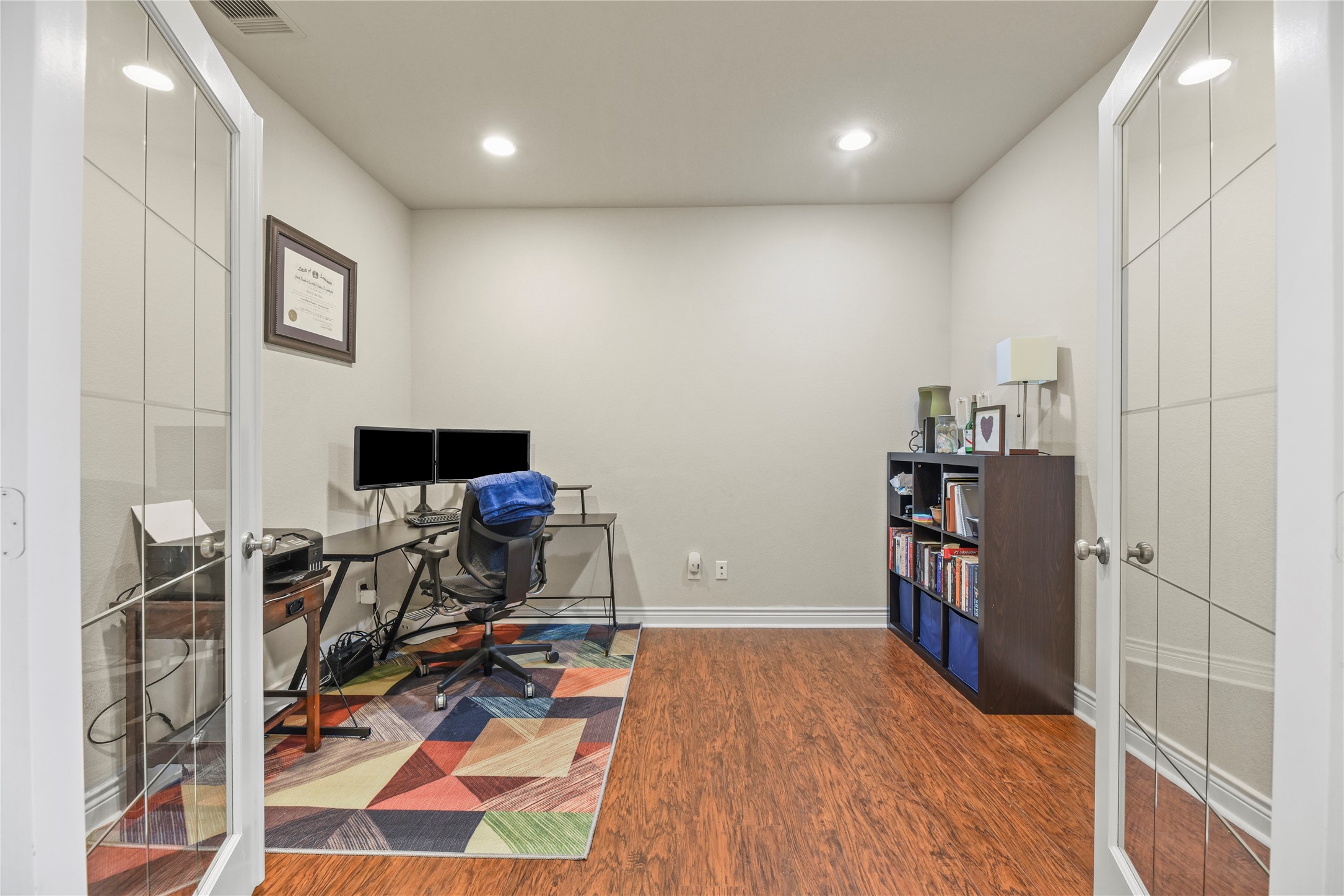 3834 Trophy Ridge Drive Spring, TX 77386 - Photo 10 of 43 a view of a workspace with furniture and a book shelf