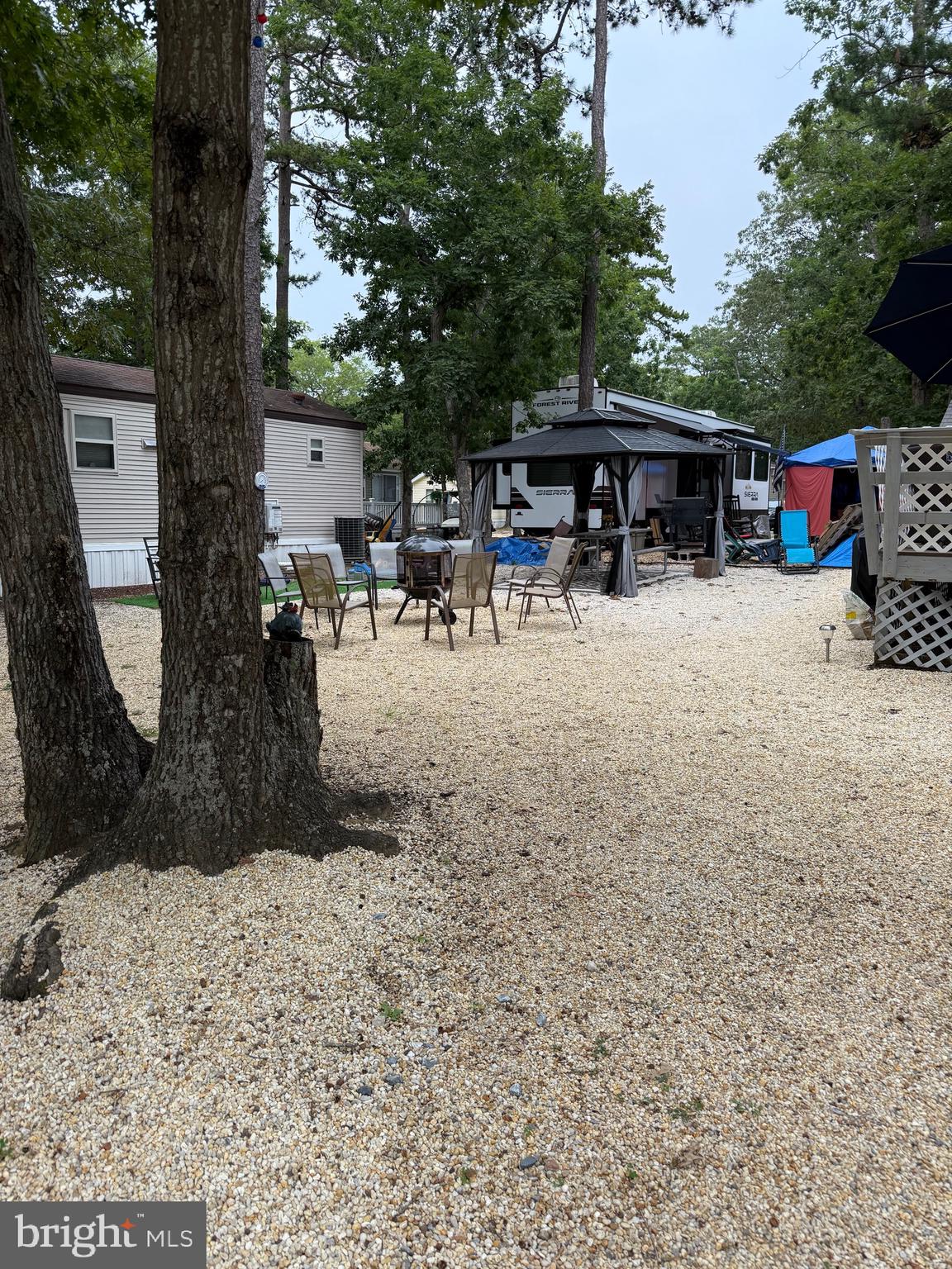 515 Corsons Tavern Road, Unit F32 Ocean View, NJ 08230 - Photo 4 of 16 a view of a backyard with a patio