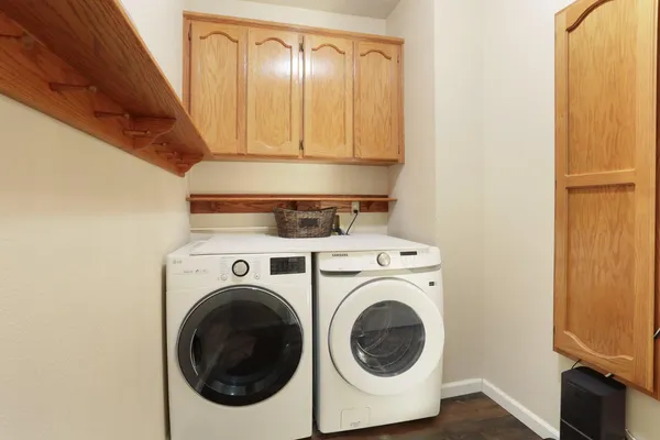 a bedroom with a bed and a television