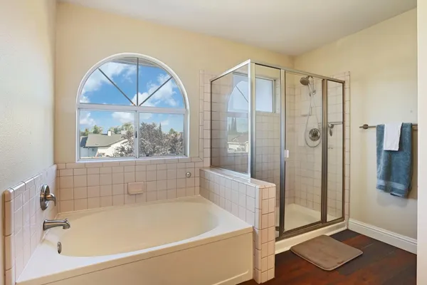 a shelf with books and knick knacks on it