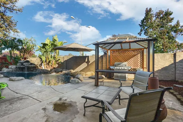 a view of a park with swings and slides