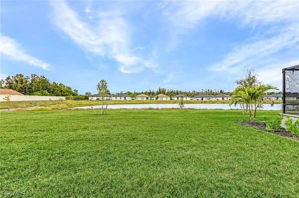 a view of yard with outdoor and green space