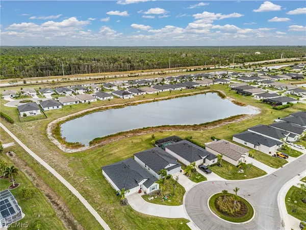 a view of a swimming pool with a balcony