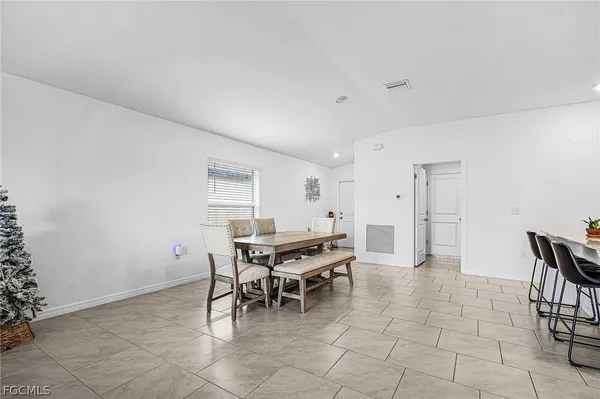 a workspace with furniture and window