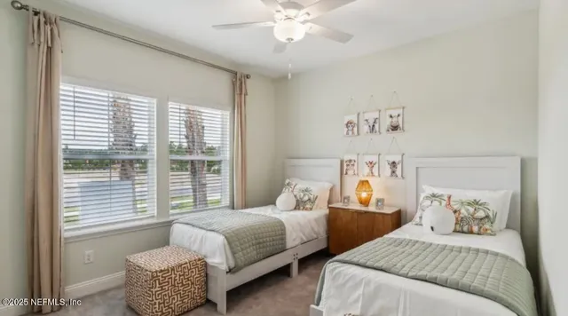 a bedroom with a bed and a night stand