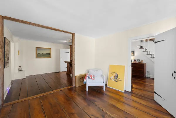 a view of livingroom with furniture and wooden floor