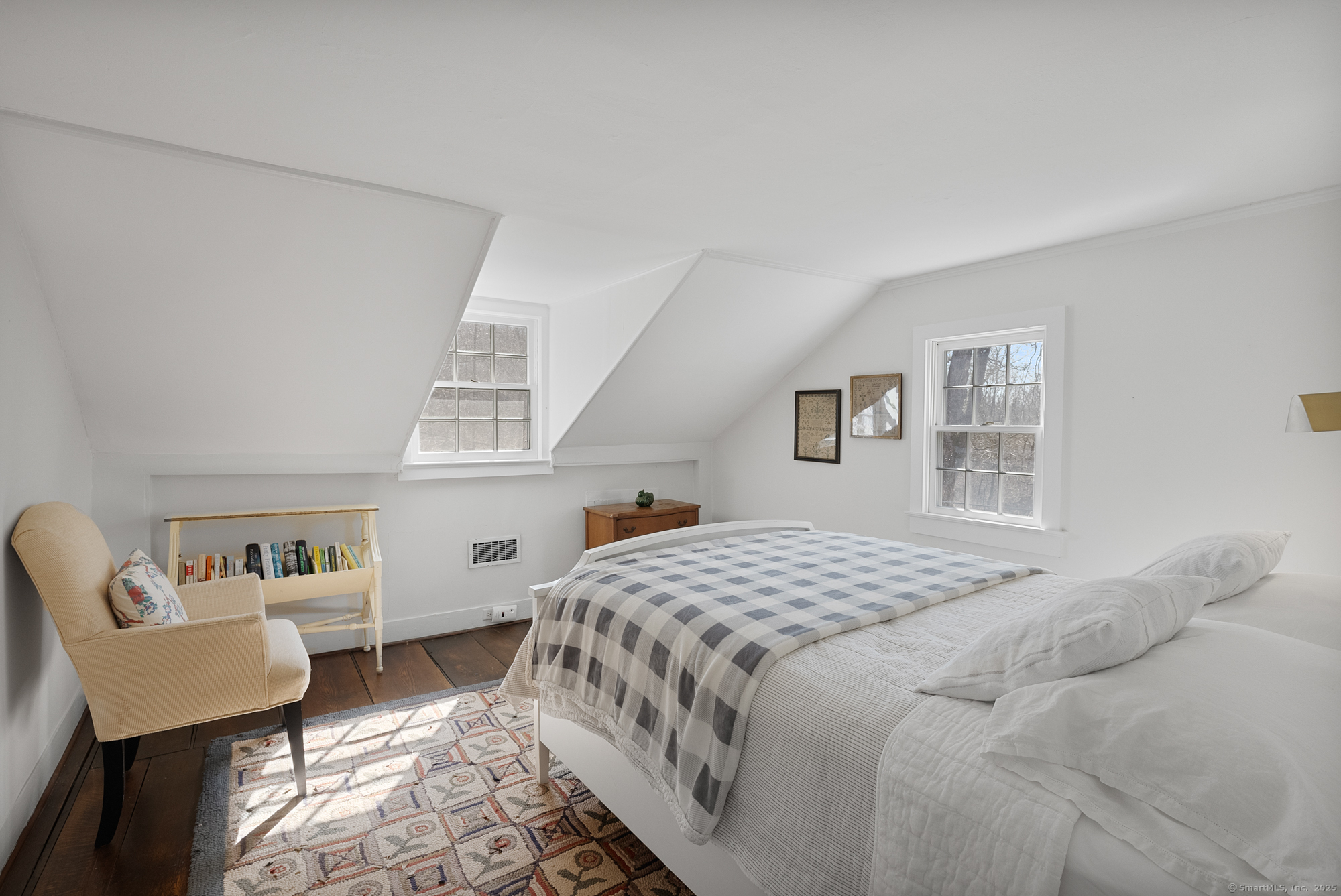 112 Chestnut Land Road New Milford, CT 06776 - Photo 22 of 32 a bedroom with a bed a couch and dresser