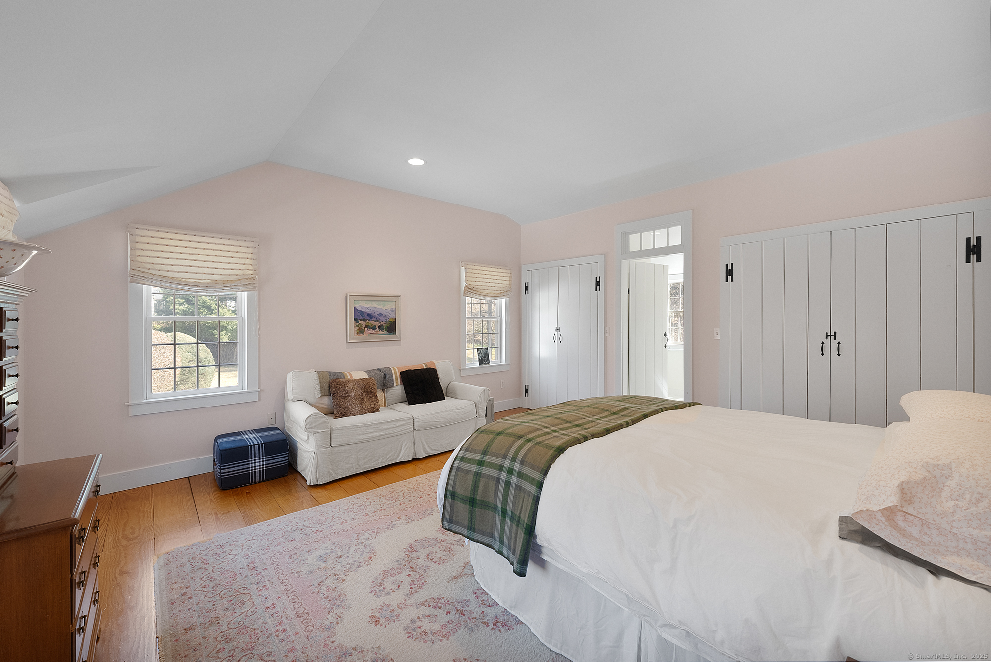 112 Chestnut Land Road New Milford, CT 06776 - Photo 26 of 32 a spacious bedroom with a bed and furniture