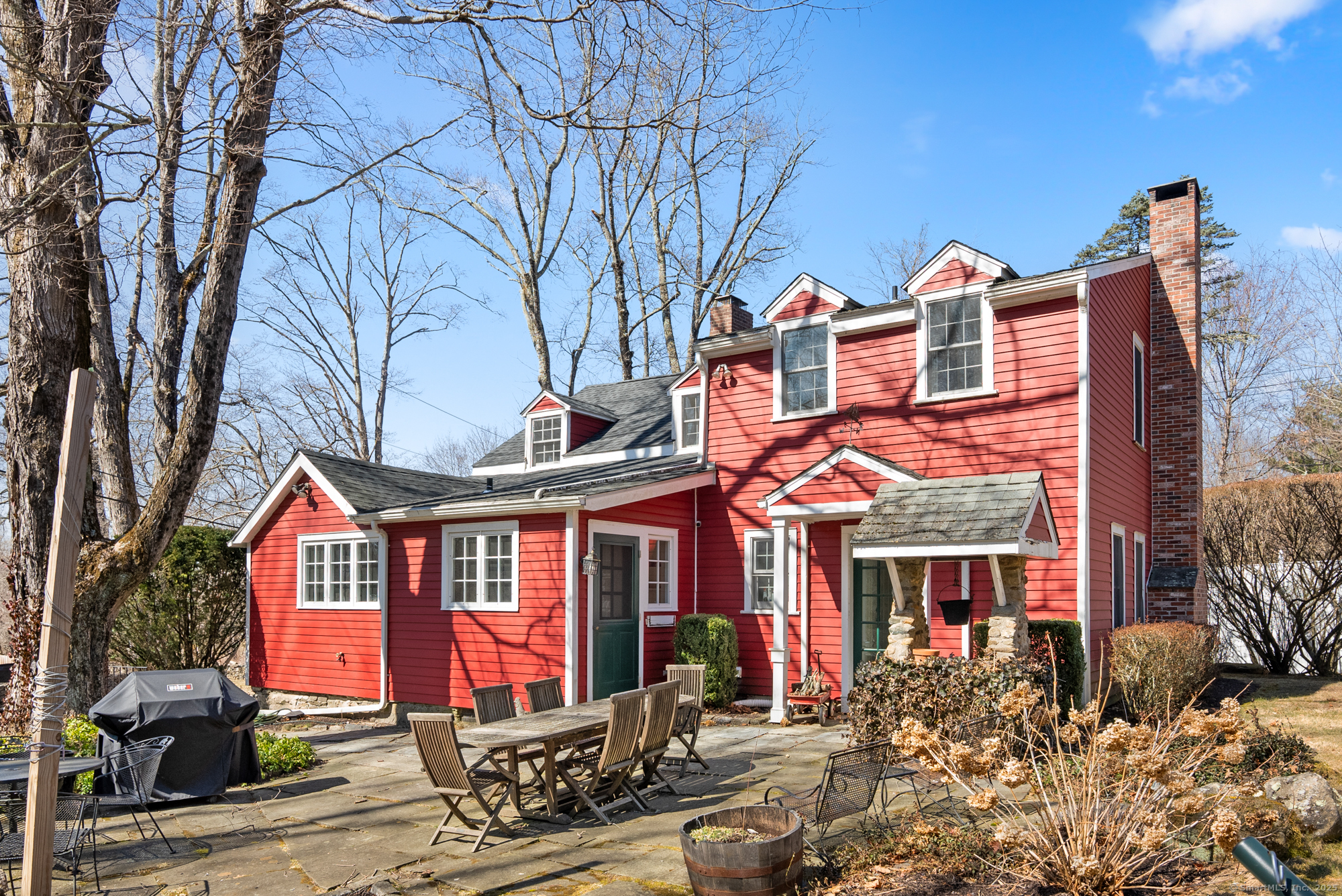 112 Chestnut Land Road New Milford, CT 06776 - Photo 29 of 32 a front view of a houses on the roadside