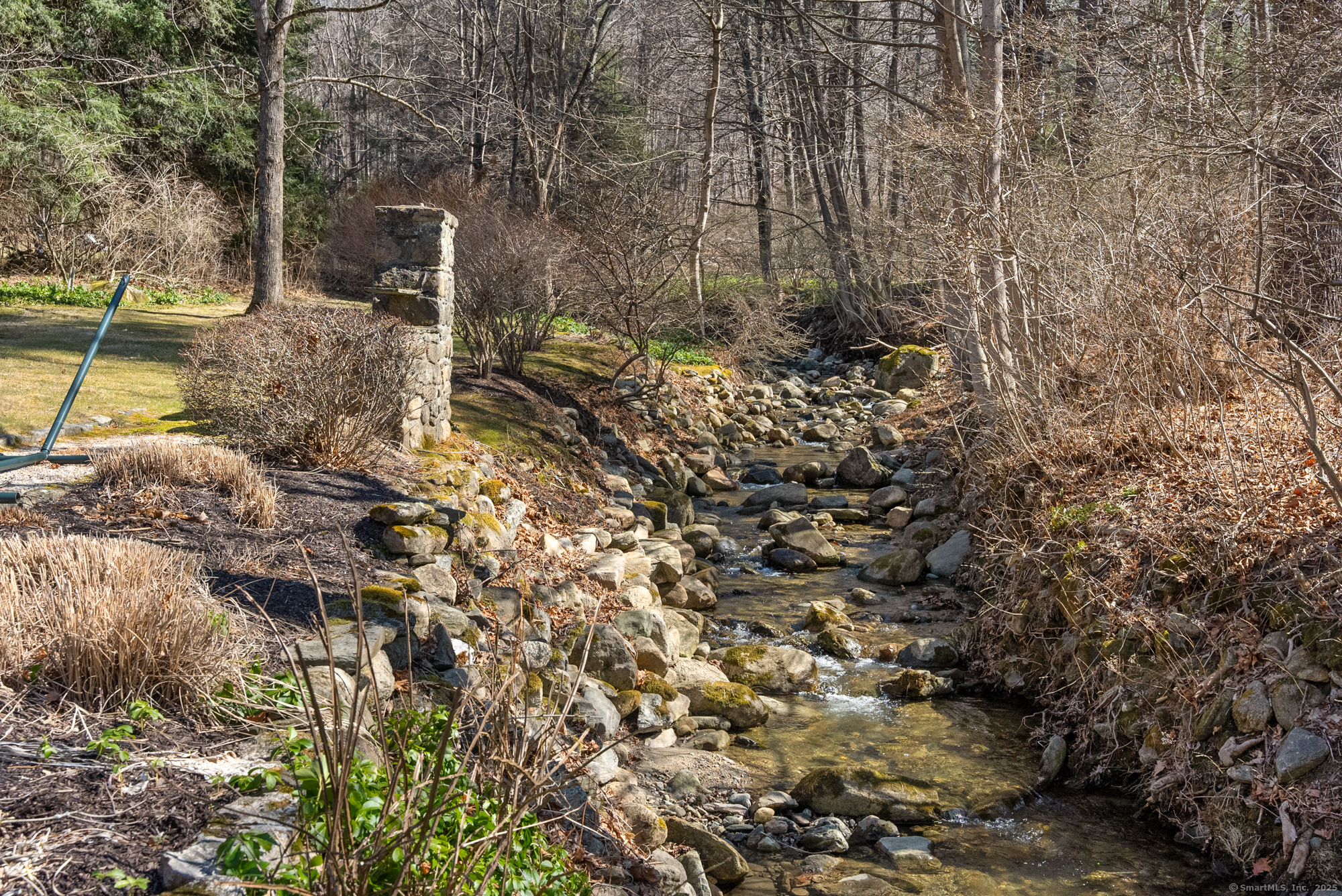 112 Chestnut Land Road New Milford, CT 06776 - Photo 4 of 32 a view of a yard with plants