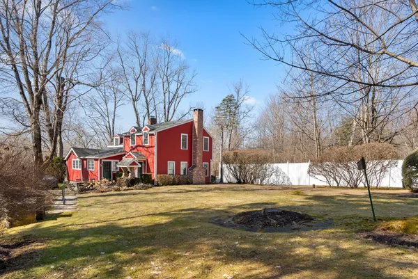 a view of street with large trees