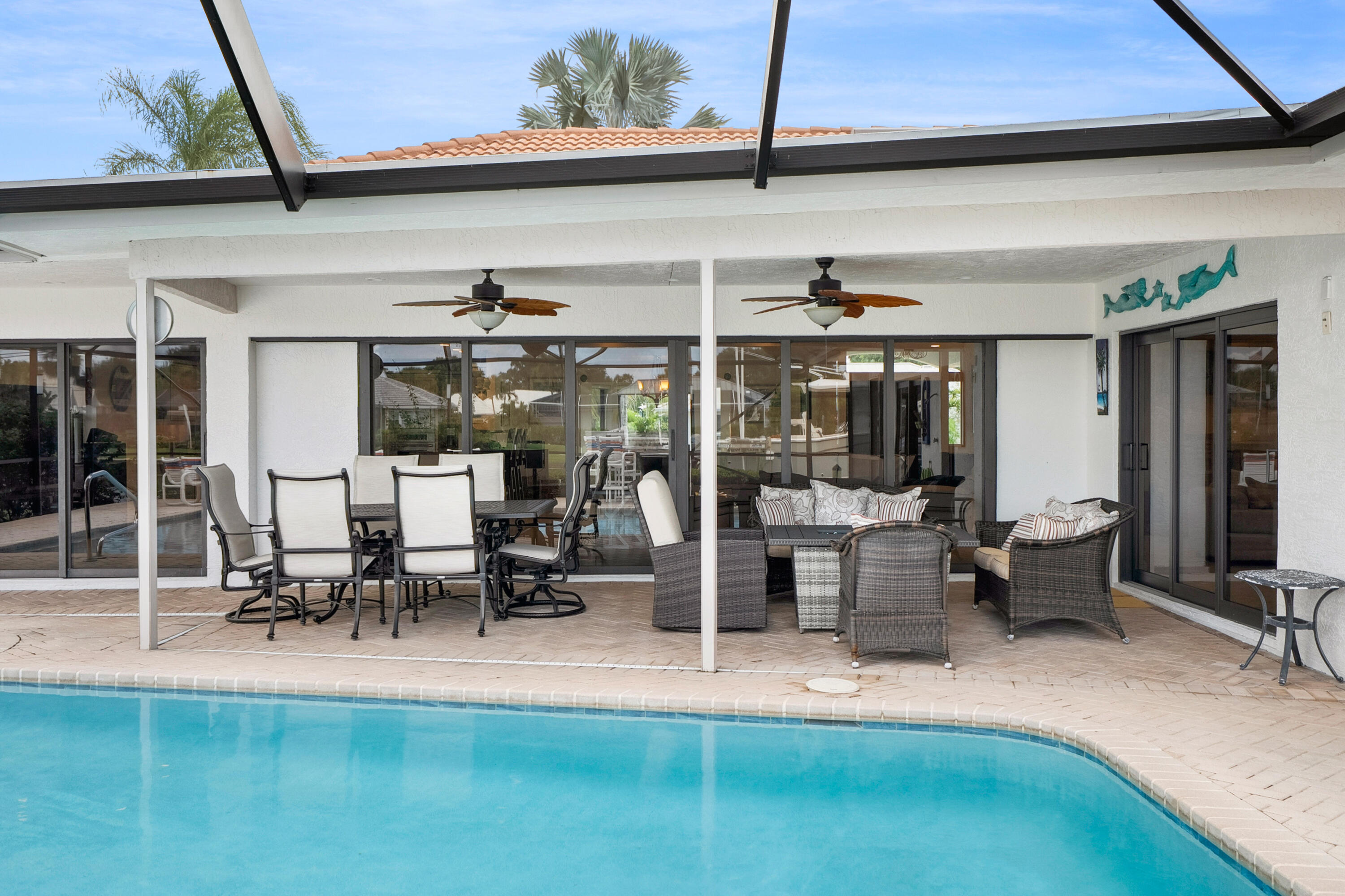 3422 Southeast Fairway West Stuart, FL 34997 - Photo 57 of 88 Covered area by pool