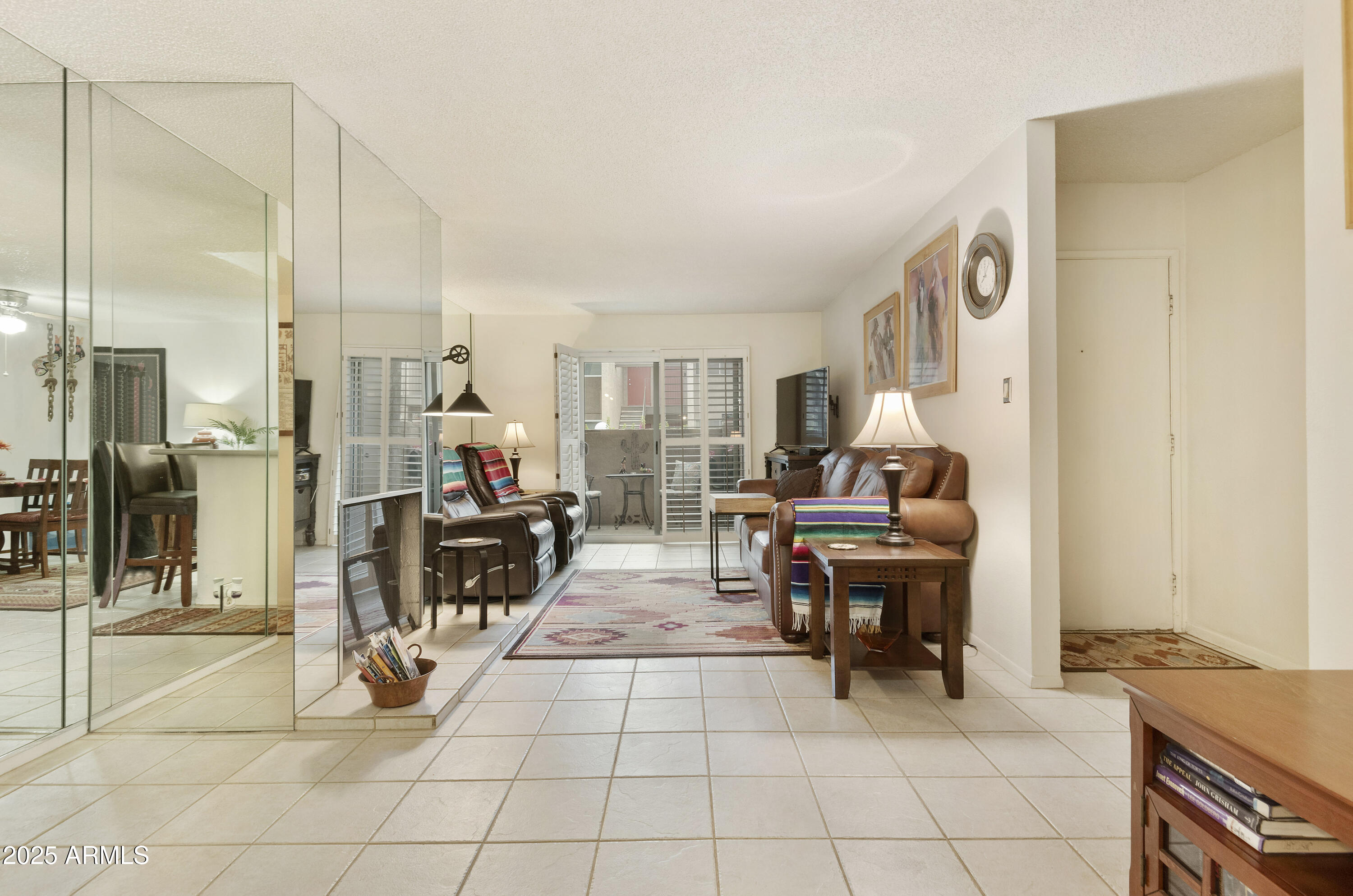 5525 East Thomas Road, Unit M16 Phoenix, AZ 85018 - Photo 5 of 27 a living room with furniture
