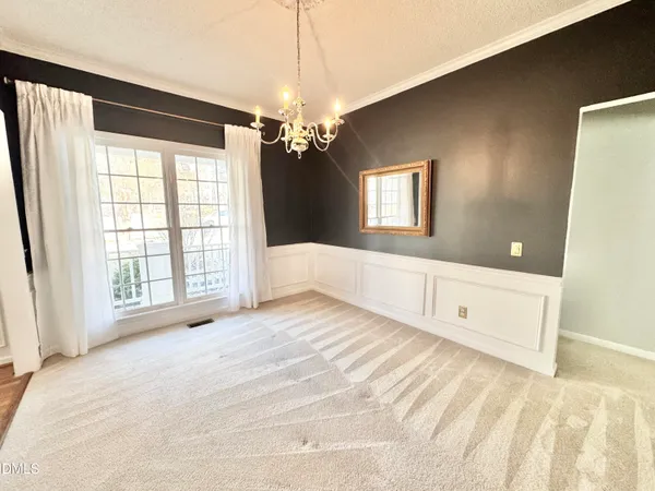 a view of a livingroom with a workspace