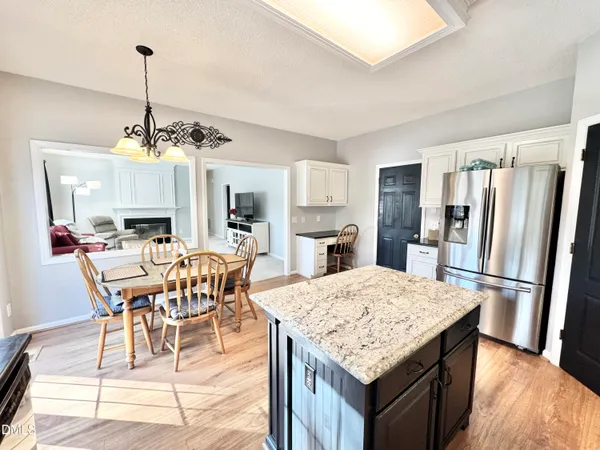 a room with gym equipment and a large window