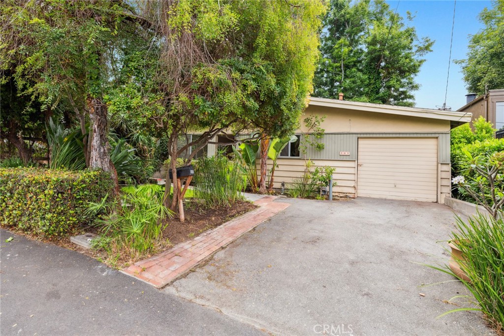 505 Graceland Drive Laguna Beach, CA 92651 - Photo 1 of 29 front view of a house with a street