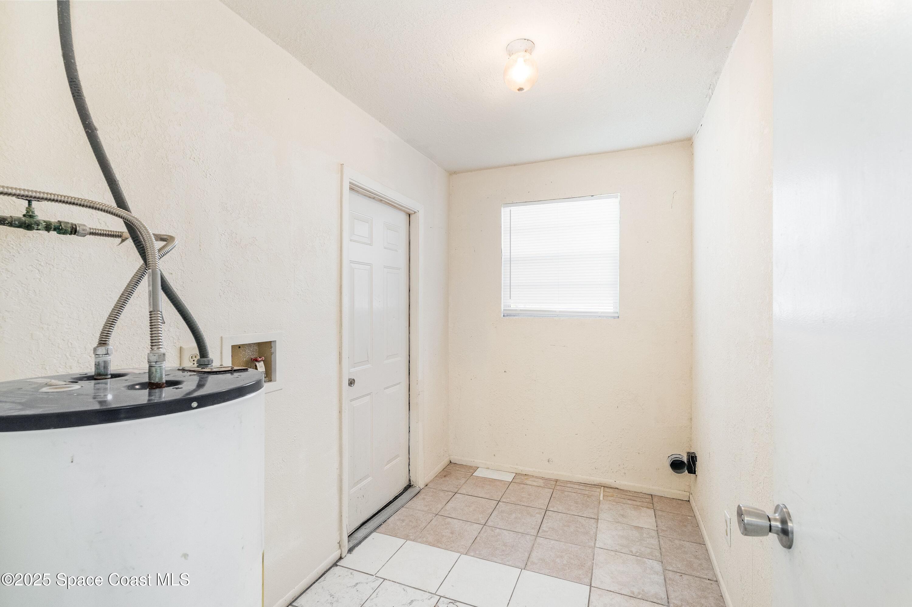 557 Cox Street Cocoa, FL 32926 - Photo 16 of 20 a view of an empty room